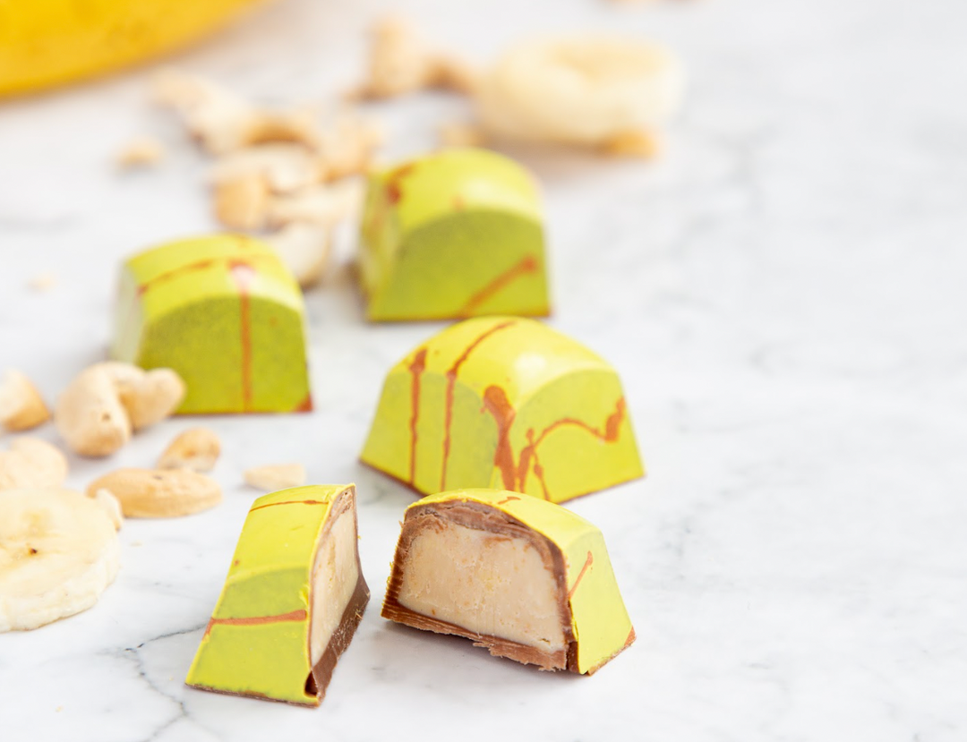 Rococo Chocolates London | Banana Cashew Bonbons: our maitre chocolatiers select the finest seasonal ingredients to bring you unusual flavours and seasonal collections.