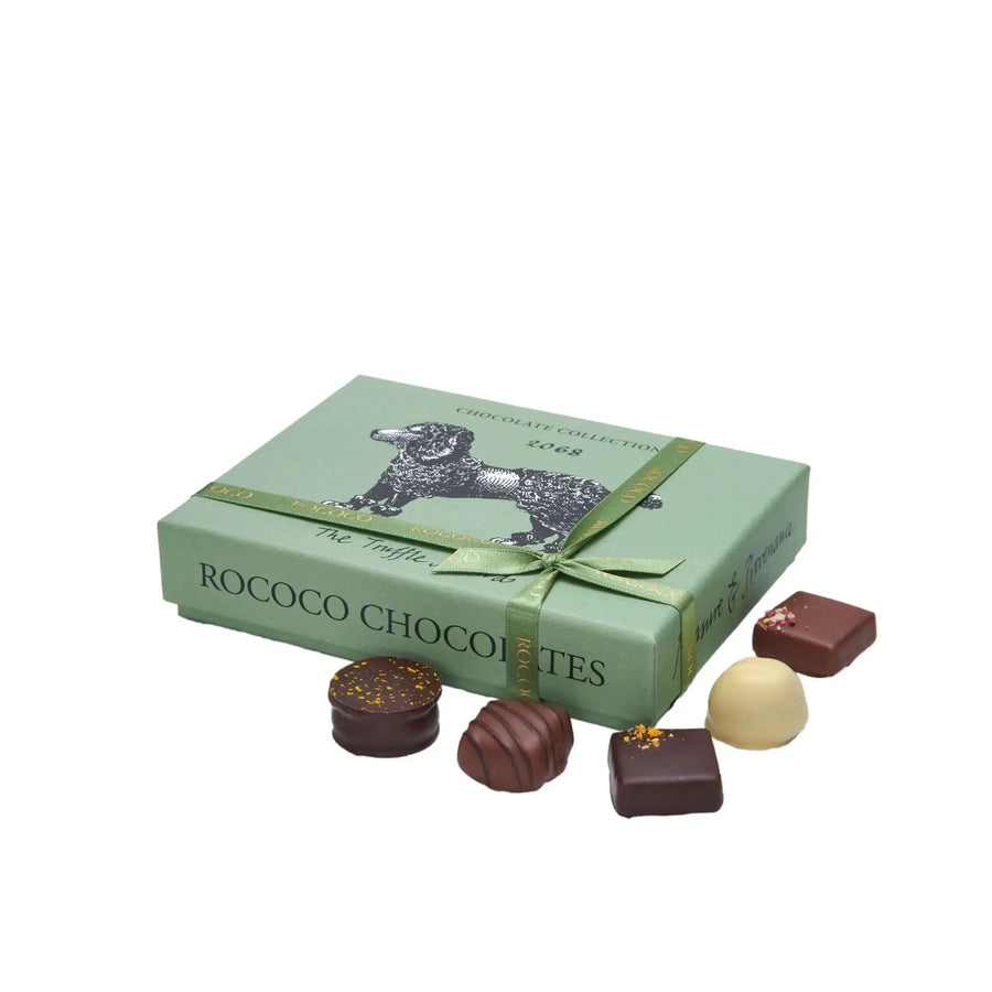 Chocolate Gift Box. Luxury chocolate gift, luxury chocolate gift box. Chocolate box filled with truffles and chocolate. Dog design, design-led packaging. Gift wrapped chocolate box, tied with ribbon. Chocolate Gift Available online. Same Day Delivery in London.